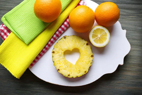 Pineapple slice with cut in shape of heart — Stock Photo, Image
