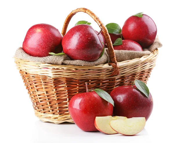 Red apples in wicker basket — Stock Photo, Image