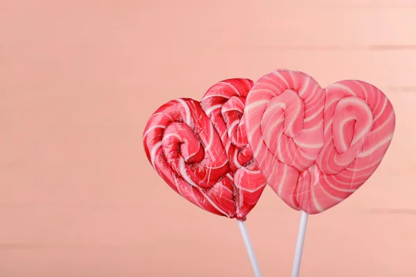 Bright lollipops in shape of heart — Stock Photo, Image