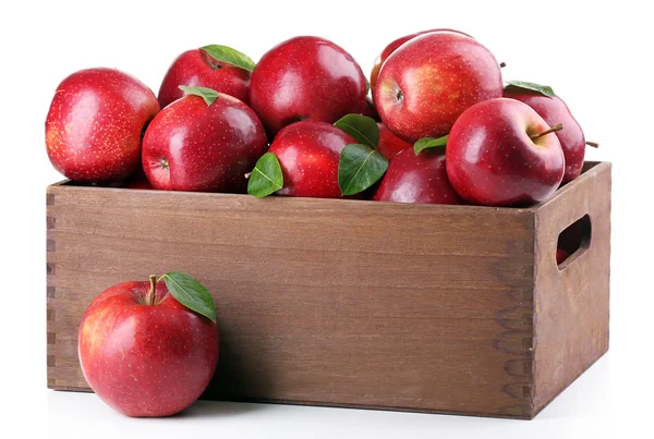Červená jablka v dřevěné bedně — Stock fotografie