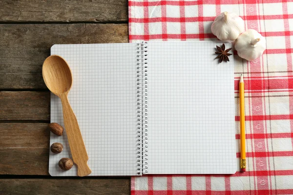 Open recipe book on napkin — Stock Photo, Image