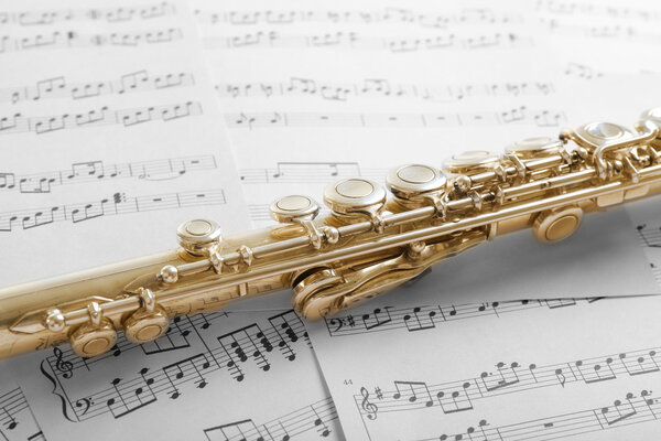 Flute on music notes