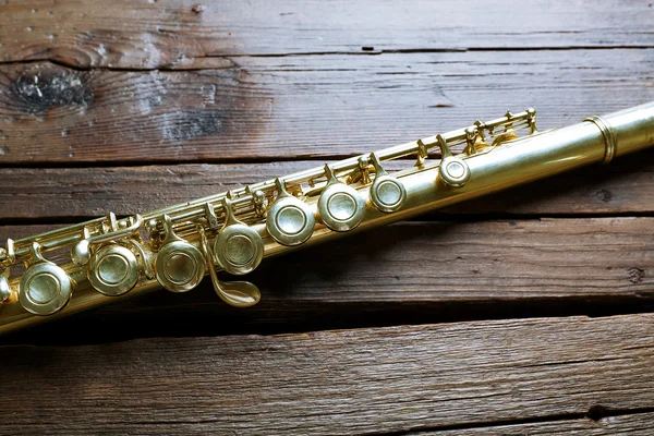 Flute on wooden background — Stock Photo, Image