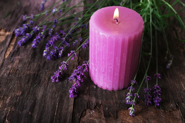 Candle with lavender flowers — Stock Photo, Image