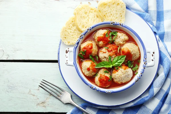 Meat balls with tomato sauce, on wooden background — Stock Photo, Image