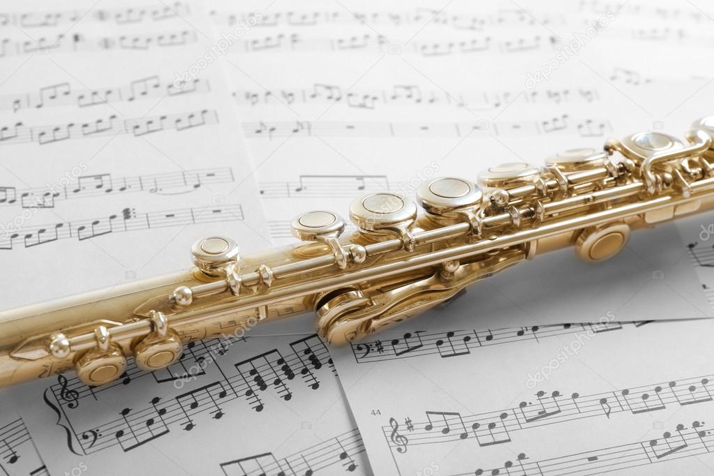 Flute on music notes