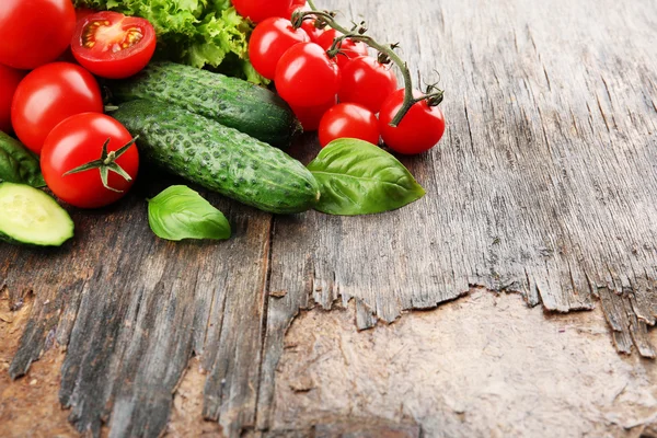 Fresh vegetables on wooden background — Stock Photo, Image