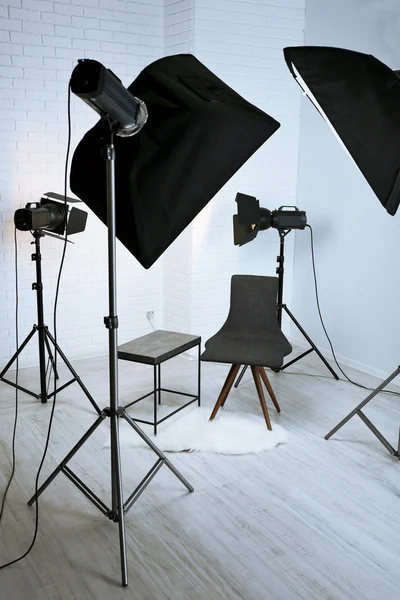 Photo studio with modern interior and lighting equipment — Stock Photo, Image