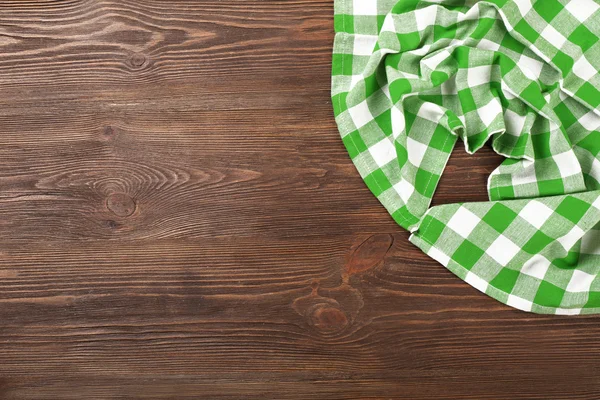 Napkin on wooden background — Stock Photo, Image