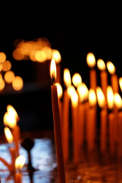Burning church candles — Stock Photo, Image