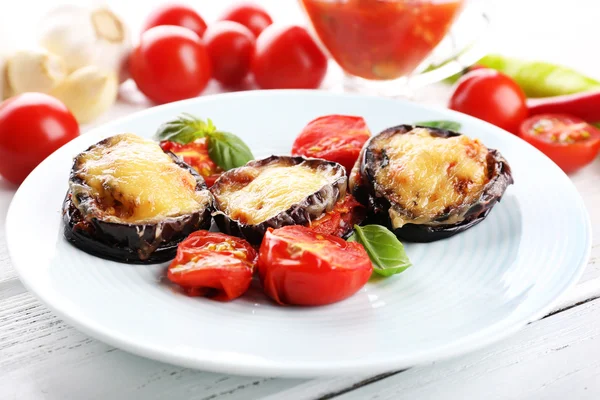 Eggplant with cherry tomatoes and cheese — Stock Photo, Image