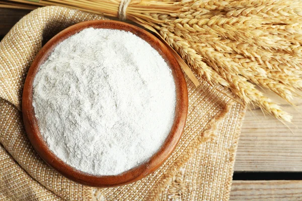 Flour with wheat ears — Stock Photo, Image