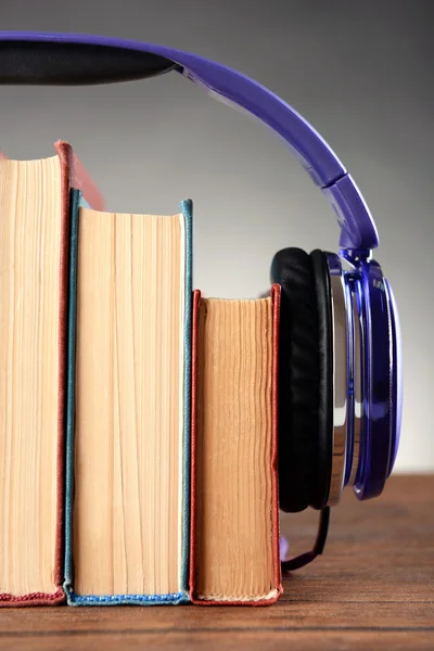 Books and headphones as audio books concept — Stock Photo, Image