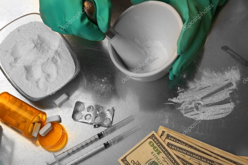 Chemist working in drug laboratory — Stock Photo © belchonock 79071608