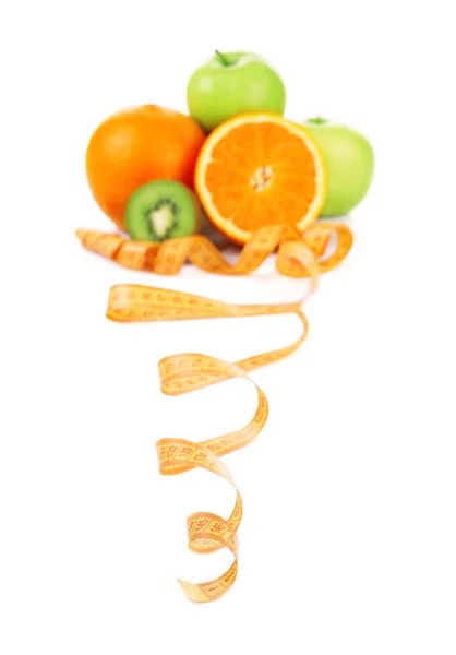 Fruits for diet and measuring tape — Stock Photo, Image