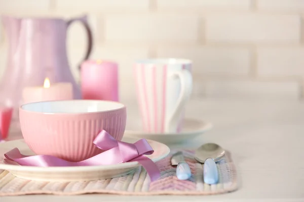 Beautiful holiday table setting in pink color — Stock Photo, Image