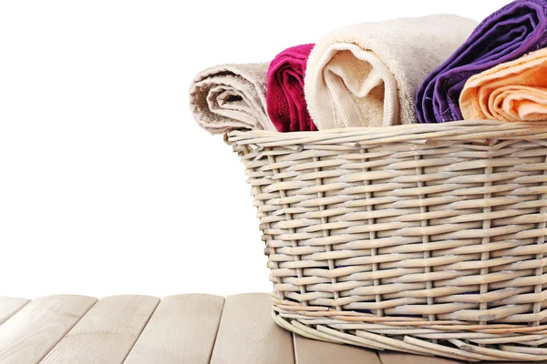 Colorful towels in basket — Stock Photo, Image