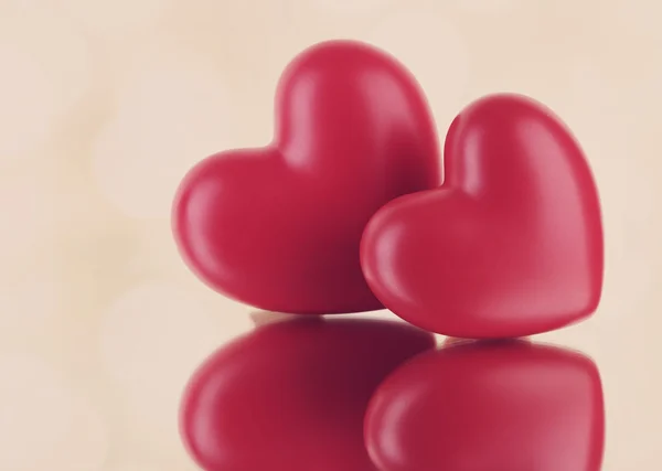 Red hearts on light background — Stock Photo, Image