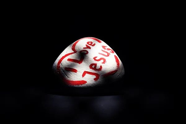 Pebble with inscription I LOVE JESUS — Stock Photo, Image