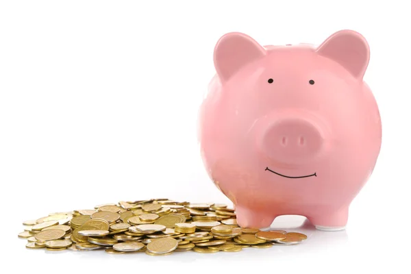 Pink piggy bank with coins — Stock Photo, Image