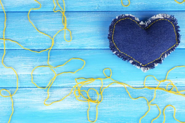 Denim heart and thread — Stock Photo, Image