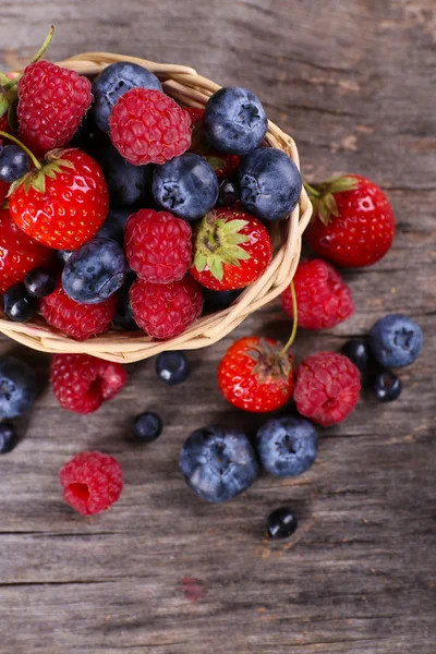 Sweet tasty berries in basket — Stock Photo, Image