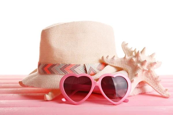 Summer accessories on wooden table — Stock Photo, Image