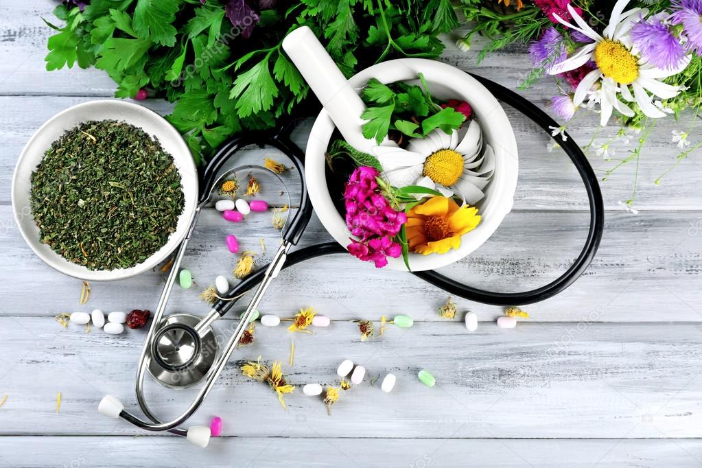 Alternative medicine herbs, berries and stethoscope