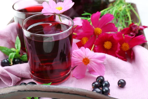 Glasses of fresh blackcurrant juice — Stock Photo, Image