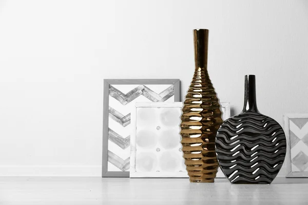 Modern vases on floor in room — Stock Photo, Image