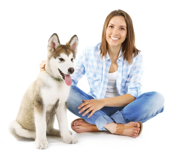 Young woman with malamute puppy — Stock Photo, Image