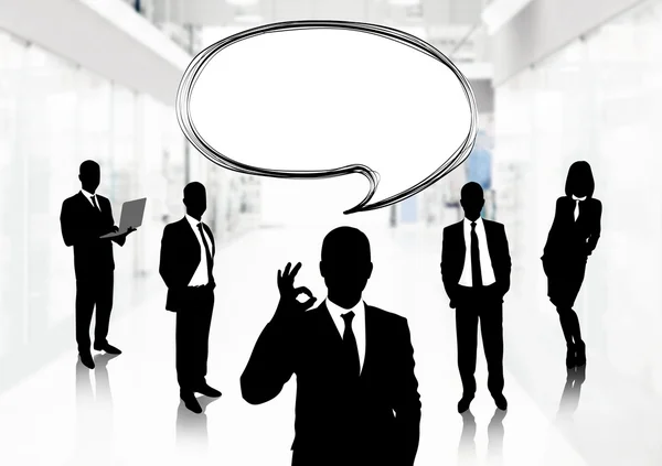 Silhouettes of business people with speech bubble on office background — Stock Photo, Image