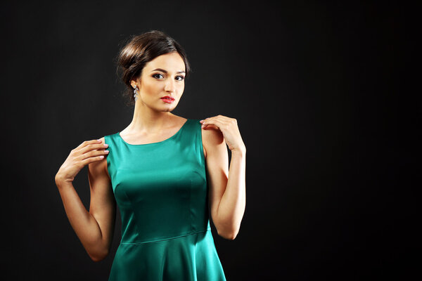 Attractive woman in green dress 