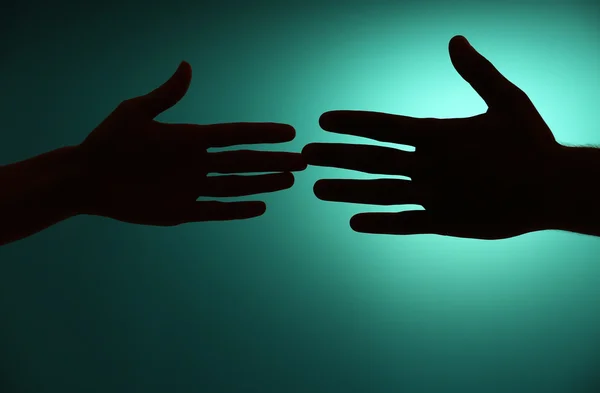 Silhouette of hands close up — Stock Photo, Image