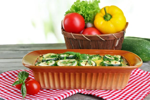 Casserole with vegetable mallow on wooden table table on light background — Stock Photo, Image