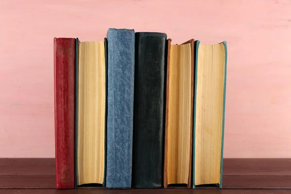 Stack of books on wooden table — Stock Photo, Image