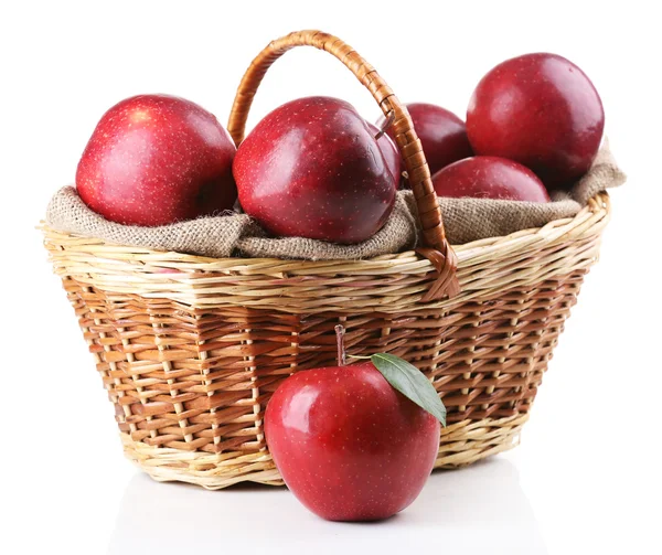 Red apples in wicker basket — Stock Photo, Image