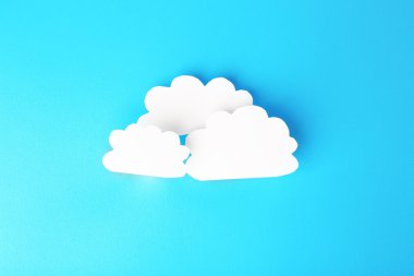 mavi zemin üzerine beyaz kağıt bulutlar