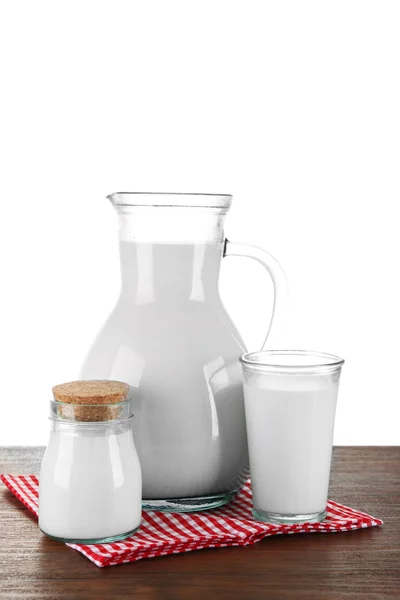 Pitcher, jar and glass of milk — Stock Photo, Image