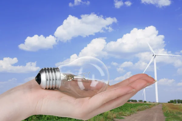 Light bulb in hand — Stock Photo, Image