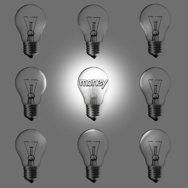 Light bulbs on grey background — Stock Photo, Image