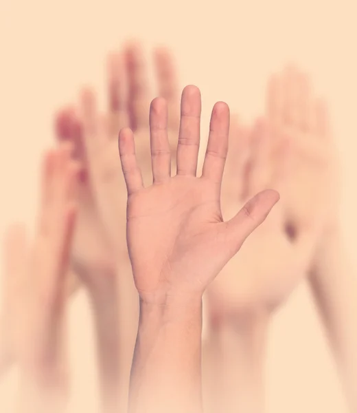 Group of young people's hands on light background — Stock Photo, Image