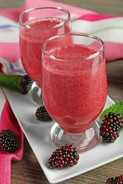 Glasses of blackberry smoothie — Stock Photo, Image