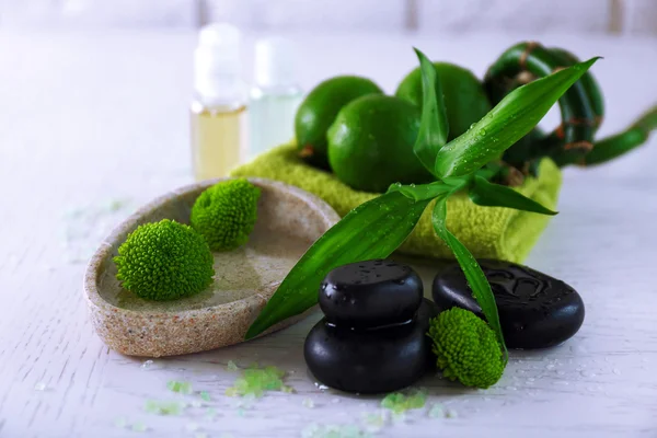 Beautiful composition of spa treatment on white wooden table — Stock Photo, Image