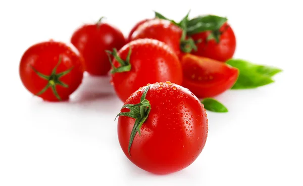Tomates cereja com manjericão isolado em branco — Fotografia de Stock