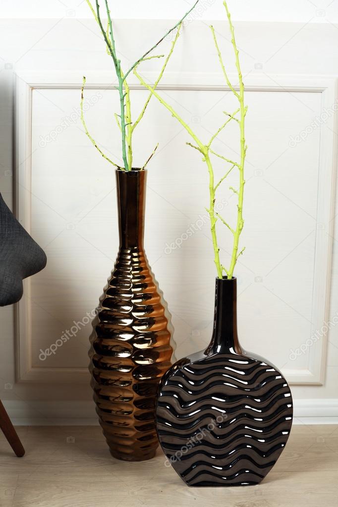 Modern vases on floor