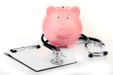 Piggy bank with stethoscope clipart