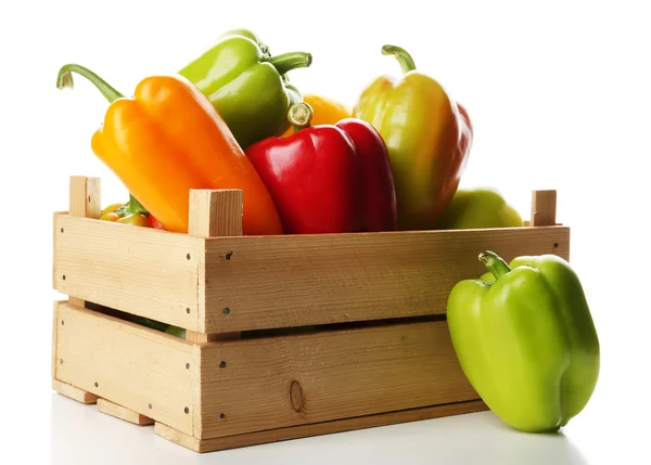 Colorful peppers in wooden crate — Stock Photo, Image