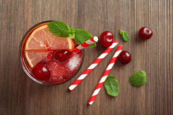 Glass of juice on table — Stock Photo, Image