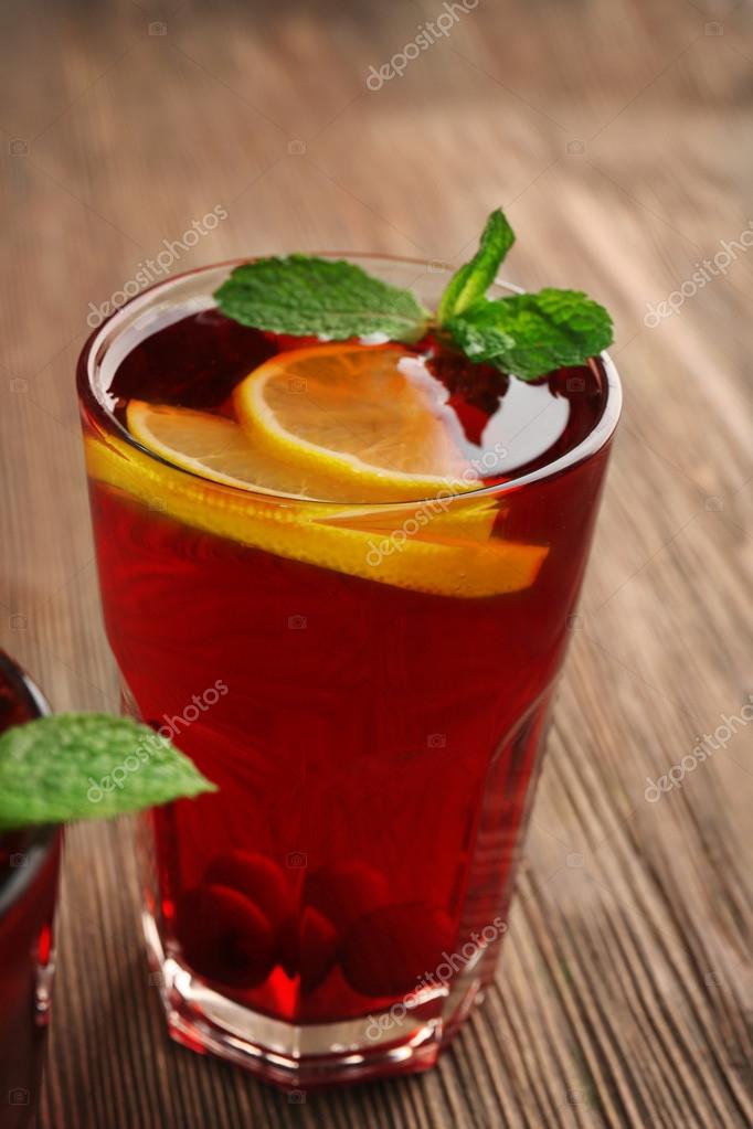 Download Glass Of Cherry Juice On Wooden Background Stock Photo C Belchonock 80074324 Yellowimages Mockups